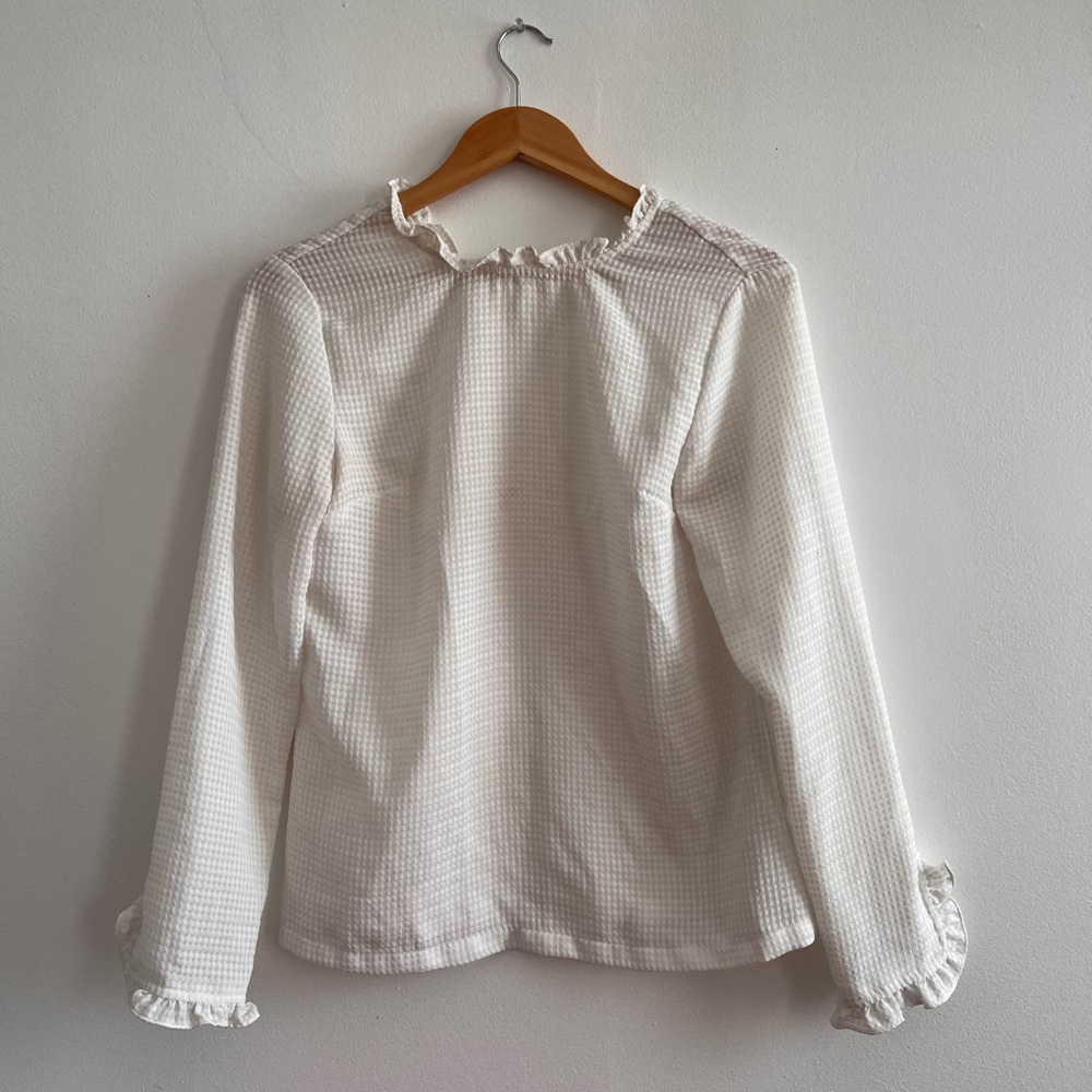 Boutique white loose long sleeve ruffle edge blouse with tie back